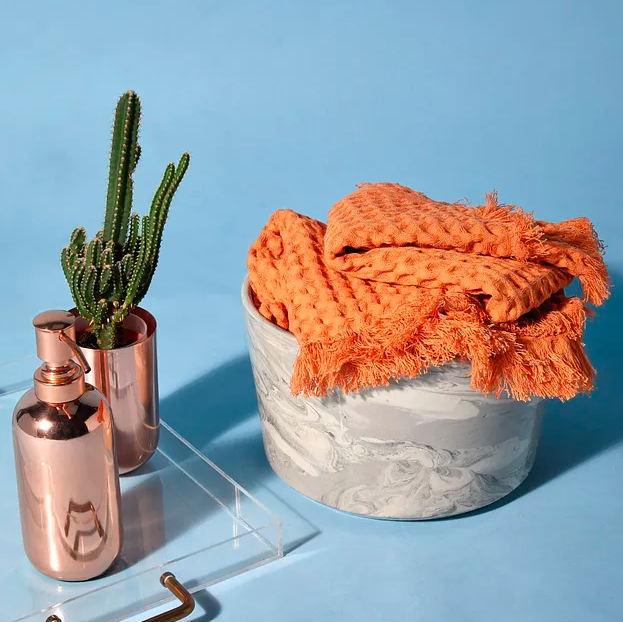 These cotton <a href="https://fave.co/2RUs9cH" rel="noopener" target="_blank" data-ylk="slk:Tangerine Waffle hand towels by The Label Life;elm:context_link;itc:0;sec:content-canvas" class="link "><strong>Tangerine Waffle hand towels by The Label Life</strong></a>. Size: 16 X 24 inches<em>Rs.474 (set of two) on offer.</em> <a href="https://fave.co/2RUs9cH" rel="noopener" target="_blank" data-ylk="slk:Buy here!;elm:context_link;itc:0;sec:content-canvas" class="link "><strong>Buy here!</strong></a>