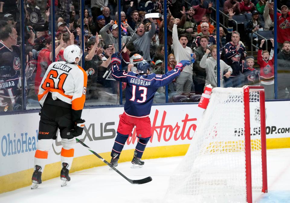 Nov 10, 2022; Columbus, Ohio, USA; Columbus Blue Jackets left wing Johnny Gaudreau (13) celebrates after scoring on Philadelphia Flyers goaltender Carter Hart (79) during the first period of their NHL game at Nationwide Arena. 