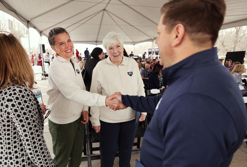 Salt Lake City Mayor Erin Mendenhall shakes hands with Steve Starks, chief executive officer of the Larry H. Miller Company, as they talk with Gail Miller at the groundbreaking of the Rocky Mountain Power plant on the west side of Salt Lake City on April 12, 2023, where Miller also announced plans to bring a Major League Baseball team to Salt Lake City. | Scott G Winterton, Deseret News