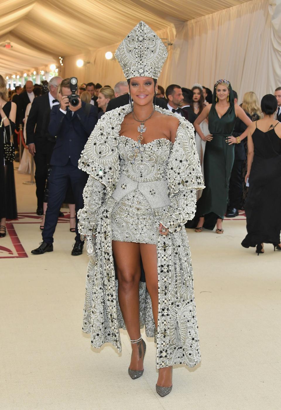 <h1 class="title">Rihanna in custom Maison Margiela by John Galliano with a custom Judith Leiber Couture clutch, Christian Louboutin shoes, Maria Tash jewelry, Cartier jewelry, and Gilan jewelry</h1><cite class="credit">Photo: Getty Images</cite>