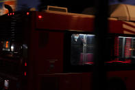 A person wears a mask to prevent the spread of coronavirus on a city bus Tuesday, Nov. 24, 2020, in San Diego. California's health secretary urged people to say "no" to family and friends who want to gather for Thanksgiving, joining other officials in issuing dire warnings about the spread of the coronavirus. (AP Photo/Gregory Bull)