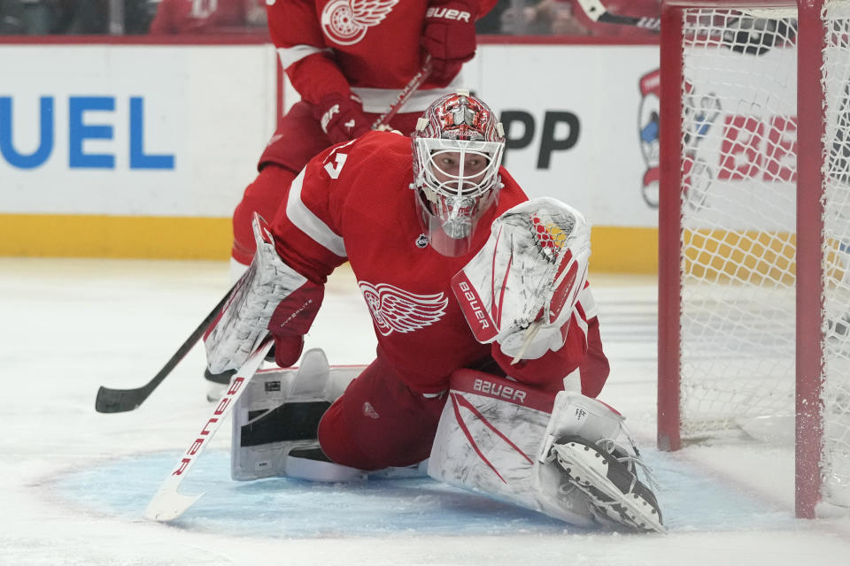 Detroit Red Wings goaltender James Reimer deflects a shot during the first period of an NHL hockey game against the Winnipeg Jets, Thursday, Oct. 26, 2023, in Detroit. (AP Photo/Carlos Osorio)