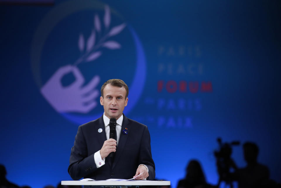 French President Emmanuel Macron speaks at the Paris Peace Forum as part of the commemoration ceremony for Armistice Day, in Paris, Sunday, Nov. 11, 2018. International leaders attended a ceremony in Paris on Sunday at mark the 100th anniversary of the end of World War I. (Gonzalo Fuentes, Pool via AP)