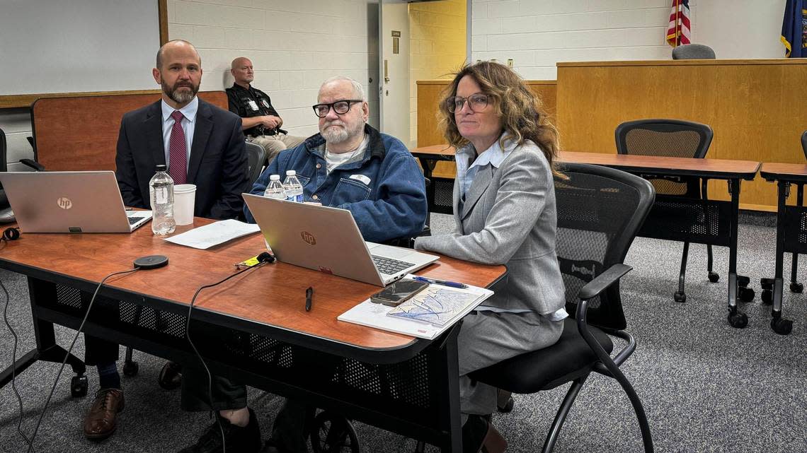 Idaho prisoner Thomas Eugene Creech, 73, center, seated with attorney Chris Sanchez, left, and Federal Defender Services of Idaho investigator Christine Hanley. San Bernardino County Sheriff’s officials recently announced they identified Creech as the suspect behind the shooting of Daniel Ashton Walker Jr. on Oct. 1, 1974 east of Barstow.