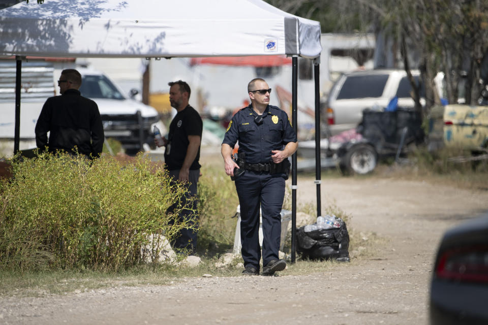 Bexar County Sheriff personnel process a crime scene during a law enforcement sting operation, Thursday, June 6, 2024, in San Antonio. (AP Photo/Darren Abate)