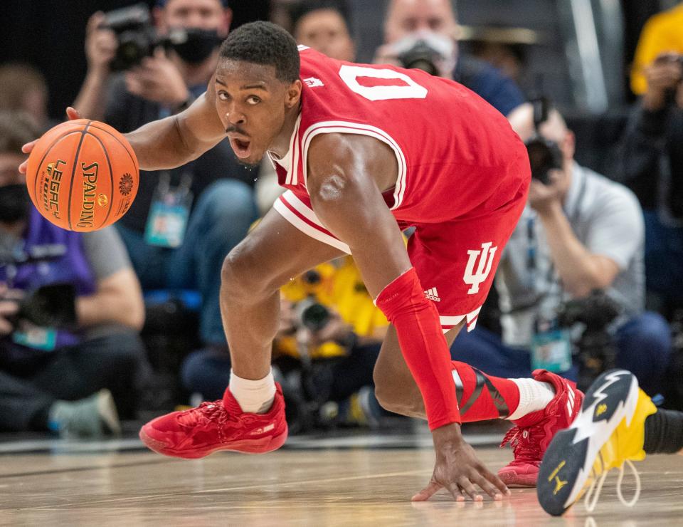 Indiana Hoosiers guard Xavier Johnson (0) comes up with a loose ball, Thursday, March 10, 2022, during Big Ten tournament men’s action from Indianapolis’ Gainbridge Fieldhouse. Indiana won 74-69. 