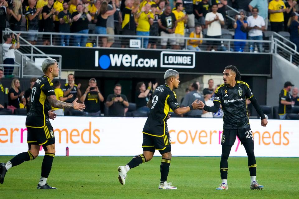 Aug 31, 2024; Columbus, OH, USA; Columbus Crew defender Mohamed Farsi (23), celebrates with forward Cucho Hernandez (9) and forward Christian Ramirez (17) during the first half against New York City FC at Lower.com Field.
Samantha Madar-The Columbus Dispatch