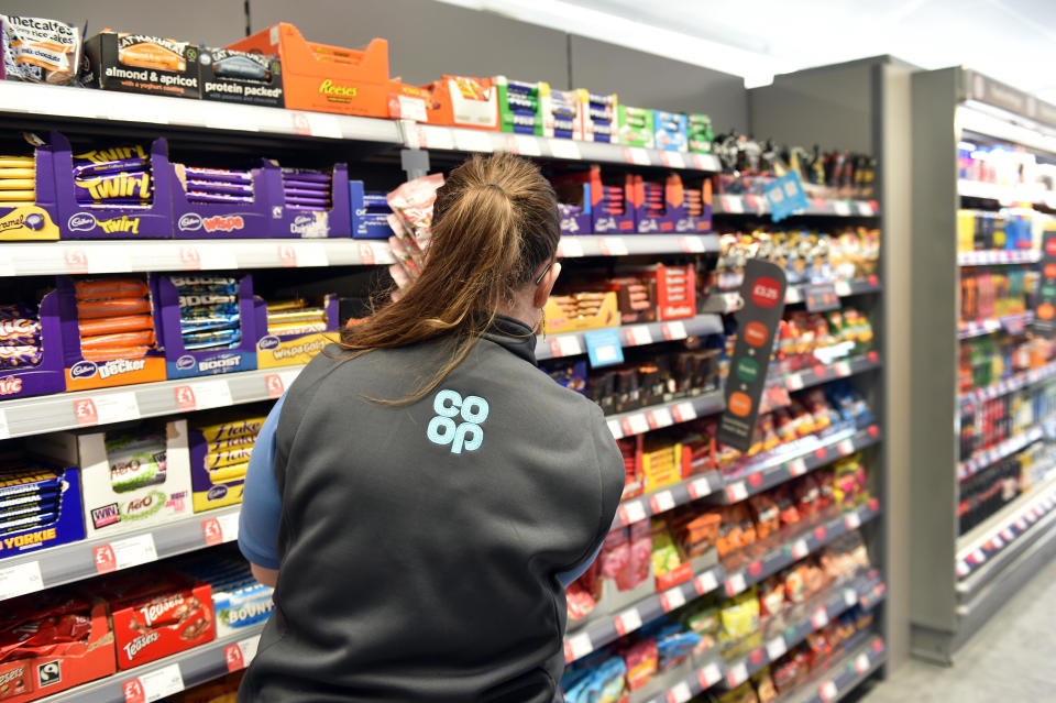 Shelf stacking in a Co-operative food store as cost of living crisis continues