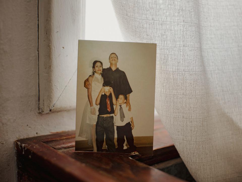 Family picture resting against a window.