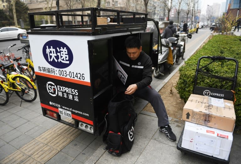 SF Express has an 80,000-strong staff -- using three-dozen aircraft and thousands of vehicles -- delivering throughout China's huge cities