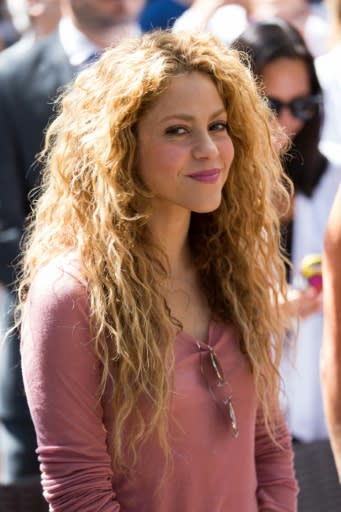 A handout picture provided by the Honorary Consulate of Lebanon in Barranquilla, Colombia, on July 13, 2018 shows Colombian singer Shakira during her visit to the northern Lebanese mountain village of Tannourine where her paternal grandmother was born