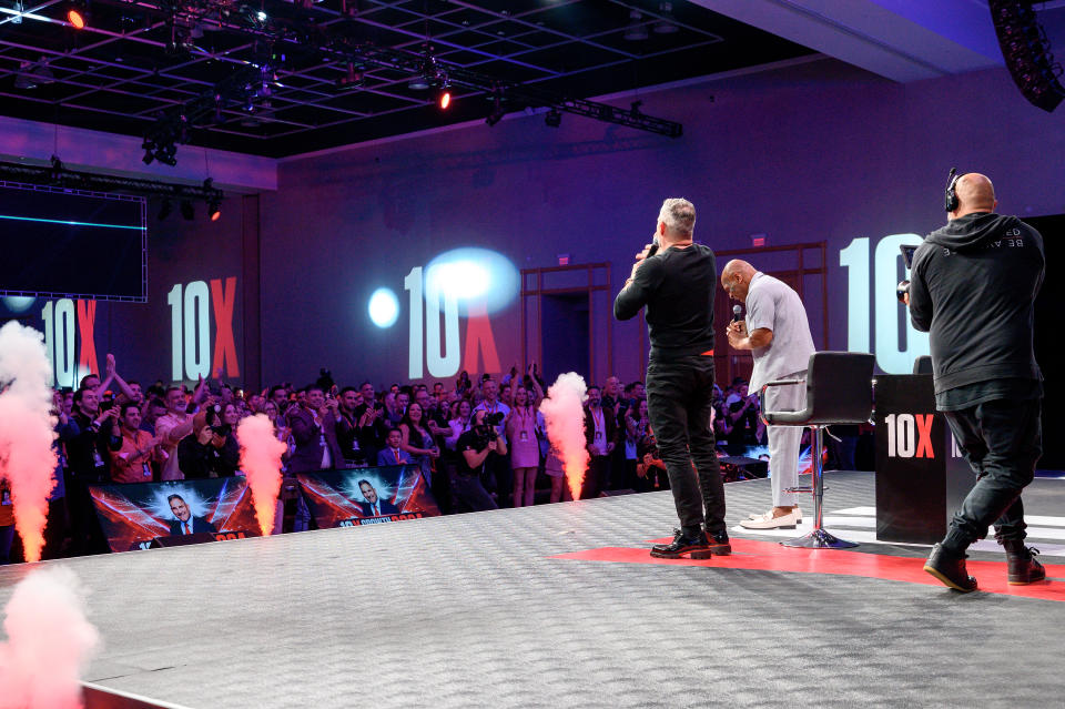 Mike Tyson attending the 10X conference in Florida in a pair of white Gucci Horsebit Loafers