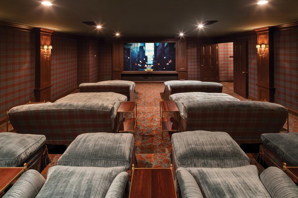 This home movie theater comes complete with bedlike couches.