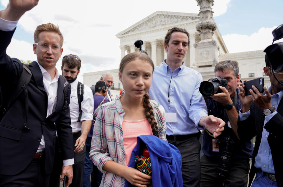 Sixteen year-old Swedish climate activist Greta Thunberg departs after attending a demonstration at the U.S. Supreme Court in Washington, U.S., September 18, 2019. REUTERS/Kevin Lamarque