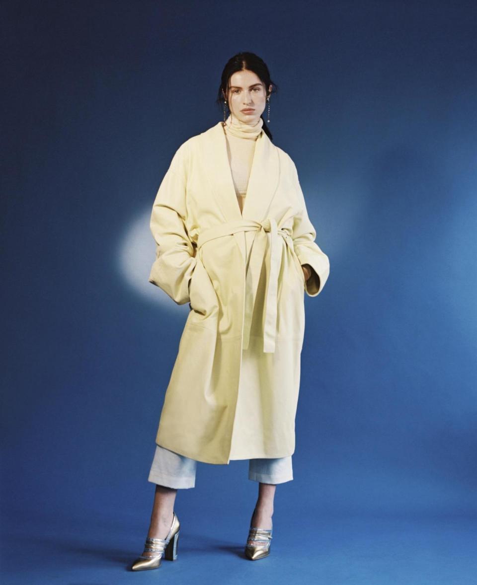 ZIMMERMANN coat, £3,150; rollneck, £350 (020 7952 2710).LOEWE jeans, £450, at matchesfashion.com.MALONE SOULIERS heels, £462, at shopbop.com. MIU MIU earrings, £170, at matchesfashion.com (Francesca Allen)