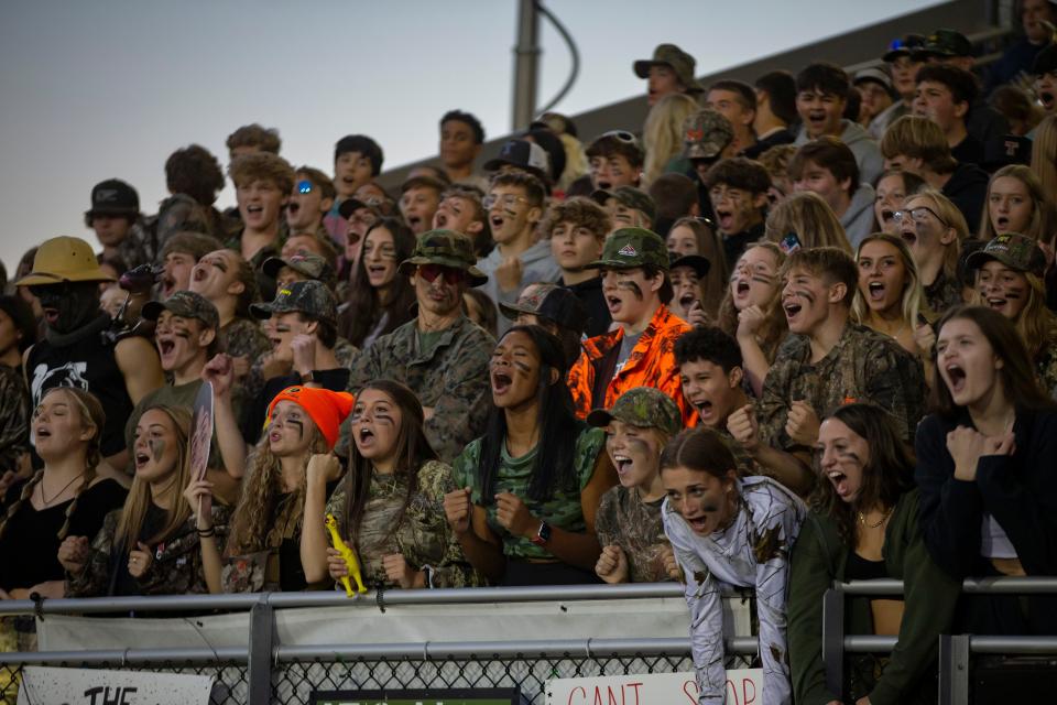 Thurston students cheer as the Colts take on the Millers Sept. 30.