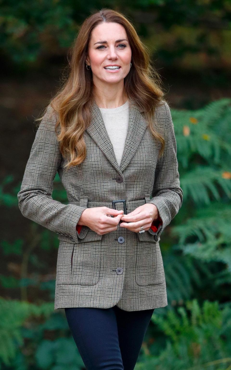 Kate wore a £395 Ivy Belted Green Tweed Jacket, available now in khaki, during a boat trip on Lake Windermere - Getty Images 