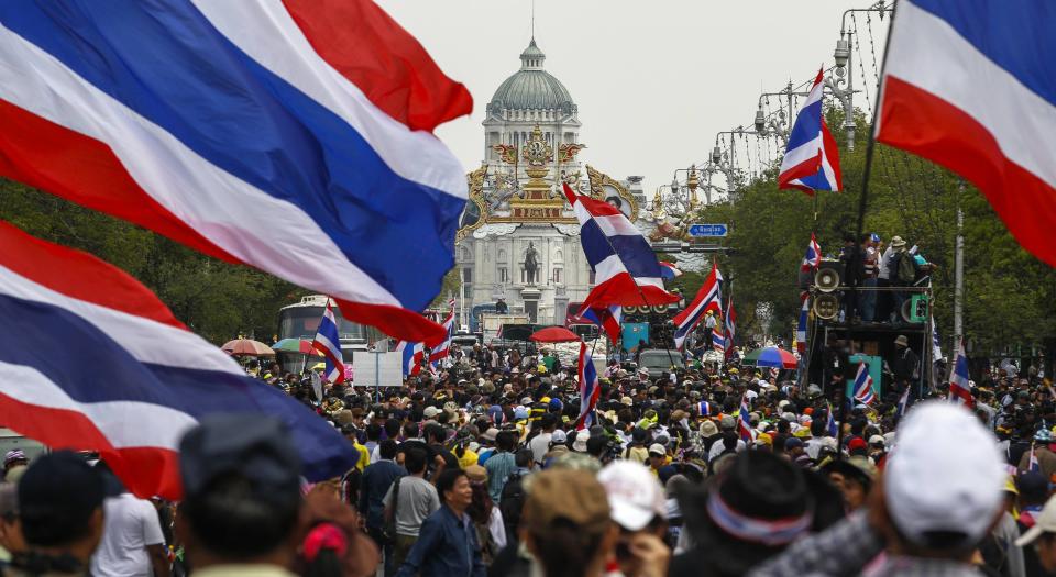 Anti-government protesters gather near Government House in Bangkok