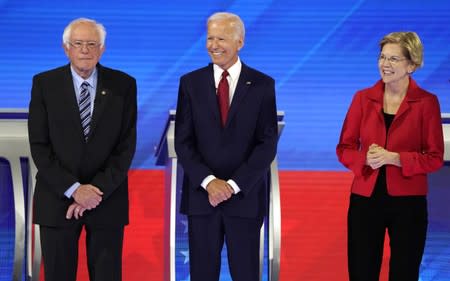 Senator Bernie Sanders joins former Vice President Joe Biden and Senator Elizabeth Warren onstage before the start at the 2020 Democratic U.S. presidential debate in Houston