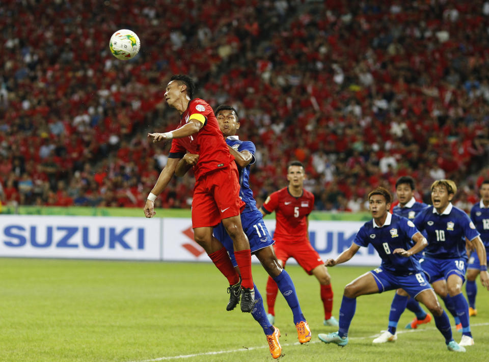 Singapore and Thailand players in action at the National Stadium in Singapore in 2014, the last time the AFF Suzuki Cup was hosted by Singapore.