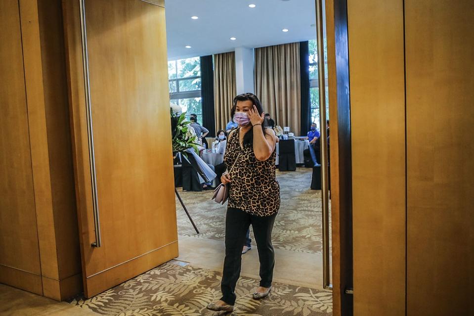 The Star’s chief content officer, Esther Ng, arrives to pay her last respects to Datuk Wong Sai Wan during his wake service at the Xiao En centre in Kuala Lumpur May 15, 2021. ― Picture by Hari Anggara