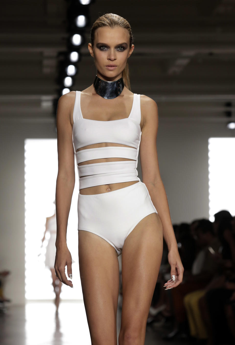 The Cushnie et Ochs Spring 2014 collection is modeled during Fashion Week in New York, Friday, Sept. 6, 2013. (AP Photo/Richard Drew)