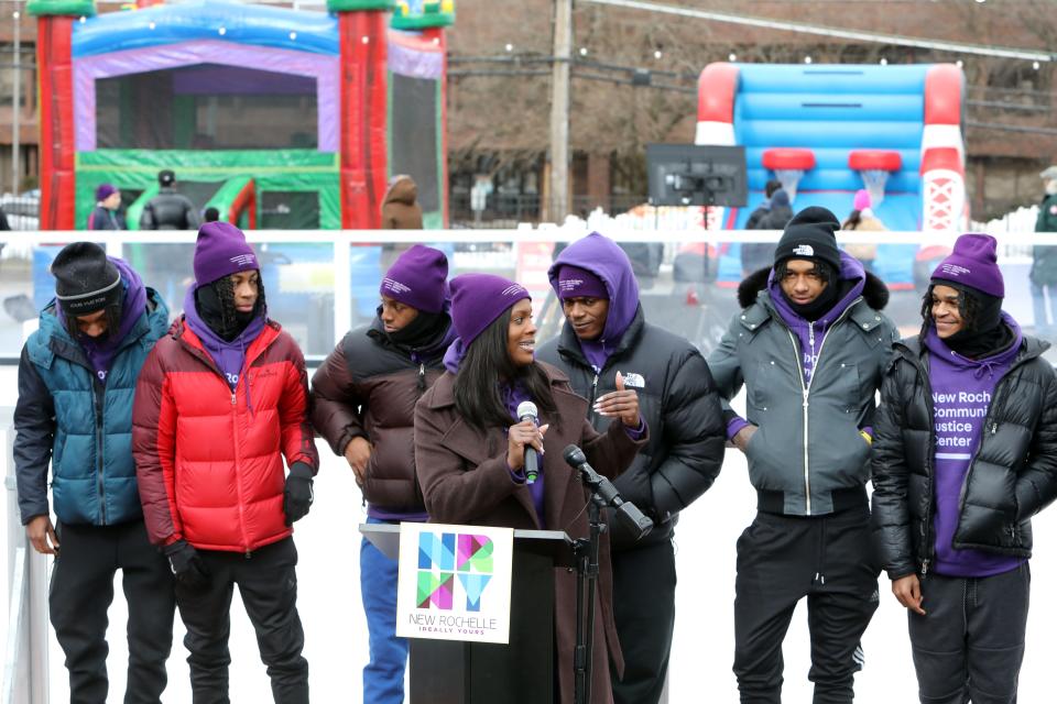 Amanda Nathan, Project Director for the New Rochelle Community Justice Center, speaks at the Winter Carnival kick-off event for the outdoor skating rink in Lincoln Park in New Rochelle Feb. 21 2024. The event was organized by the city council, the City of New Rochelle and the New Rochelle Community Justice Center. The rink is free to use and is open from noon to 7 p.m. daily until Saturday, Feb. 24.
