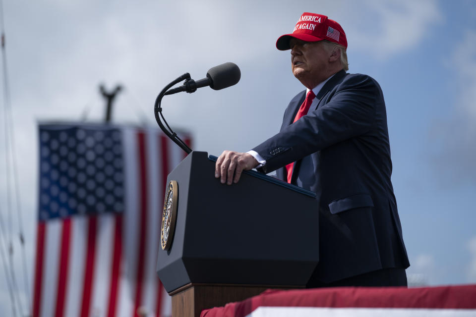 President Donald Trump speaks during a campaign rally outside Raymond James Stadium, Thursday, Oct. 29, 2020, in Tampa. (AP Photo/Evan Vucci)