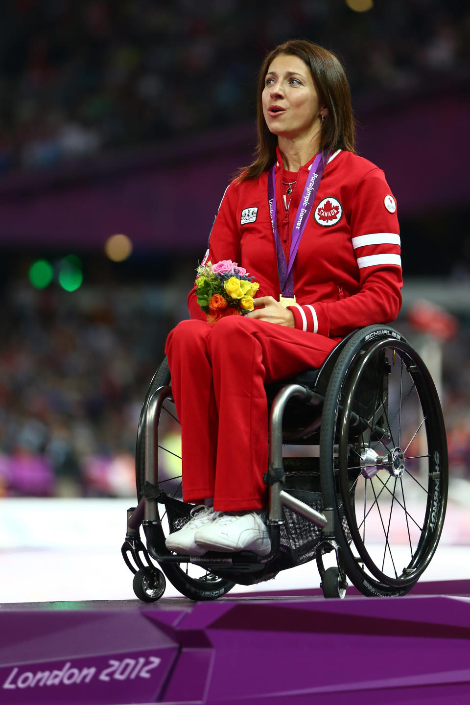 LONDON, ENGLAND - SEPTEMBER 01: Gold medalist Michelle Stilwell of Canada poses on the podium during the medal ceremony in the Women's 200m - T52 on day 3 of the London 2012 Paralympic Games at Olympic Stadium on September 1, 2012 in London, England. (Photo by Michael Steele/Getty Images)