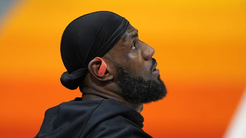 Los Angeles Lakers forward LeBron James (23) warms up before their NBA basketball game against the Utah Jazz Wednesday, Feb. 24, 2021, in Salt Lake City. (AP Photo/Rick Bowmer)