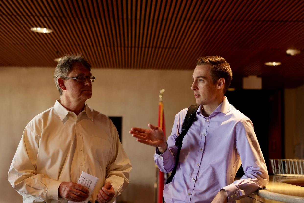 U.S. Senate candidate Jared Young and U.S. House candidate Blake Ashby confer before the two submit the necessary signatures to put the Better Party on the 2024 ballot.