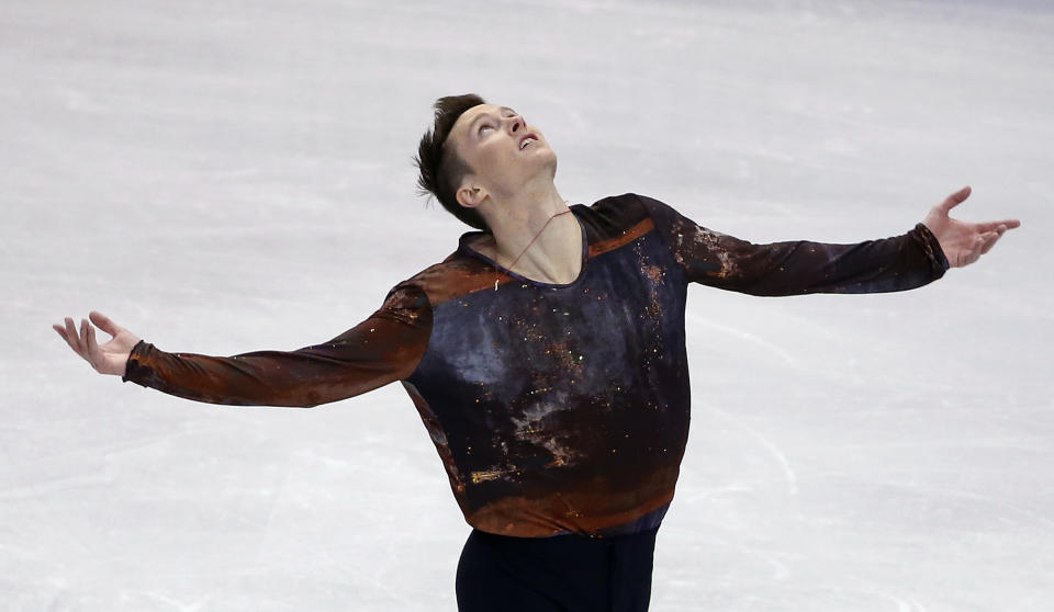 Jeremy Abbott competes in the men's free skate at the U.S. Figure Skating Championships in Boston, Sunday, Jan. 12, 2014. (AP Photo/Elise Amendola)