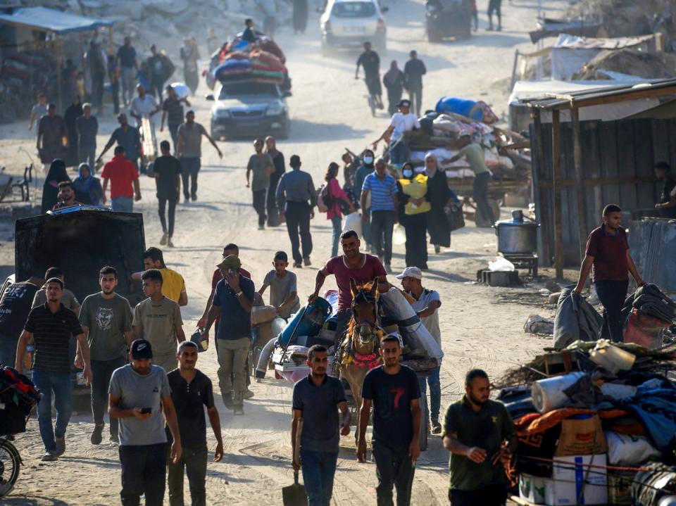 Displaced Palestinians from areas in east Khan Yunis arrive to the city as they flee after the Israeli army issued a new evacuation order for parts of the city and Rafah, in the southern Gaza Strip on 2 July 2024, amid the ongoing conflict between Israel and the Palestinian Hamas militant group (AFP via Getty Images)