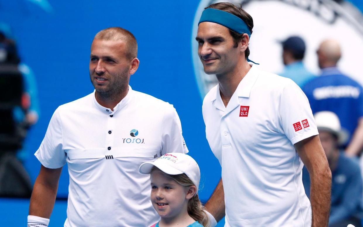 Dan Evans has recently spent time training with Roger Federer in Switzerland - Reuters