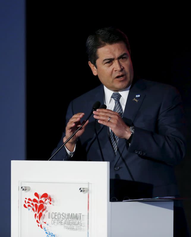 FILE PHOTO: Honduras' President Hernandez addresses the audience during the II CEO Summit of the Americas in Panama City