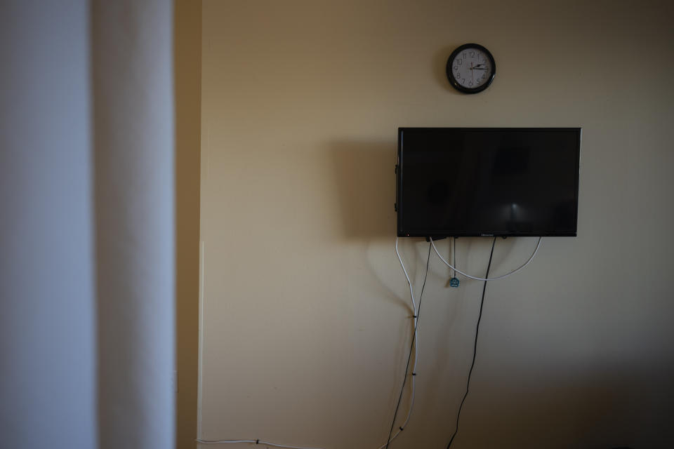 A television and clock hang on the wall of Alex Morisey's room at a nursing home, Wednesday, Feb. 15, 2023, in Philadelphia. The federal government hasn't adjusted Medicaid's personal needs allowance for nursing home residents since 1987. It is meant to pay for anything not provided by the home, from a phone to clothes and shoes to a birthday present for a grandchild. The minimum rate is $30 monthly. Pennsylvania’s allowance is $45. (AP Photo/Wong Maye-E)