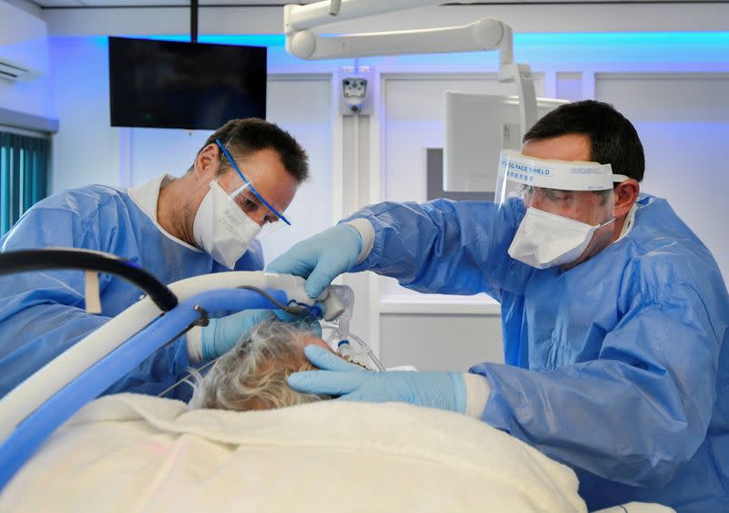 FILE PHOTO: Medics treat a patient infected with COVID-19, in the intensive care unit at Maastricht UMC+ Hospital in Maastricht, Netherlands