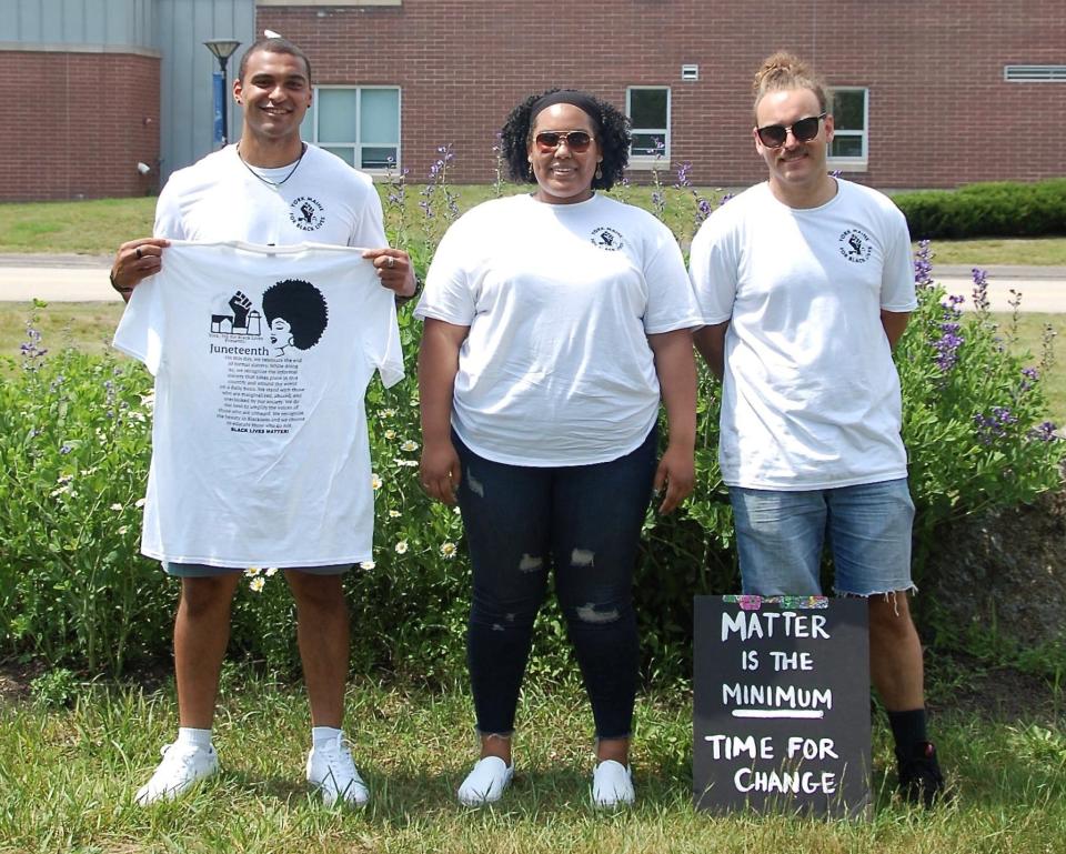 Stevo Reid, Jailynn Caraballo, and Ethan McDonough, cofounders of York Maine for Black Lives, stand in front of York High School before the Juneteenth walk-a-thon they organized Saturday, June 19, 2021.