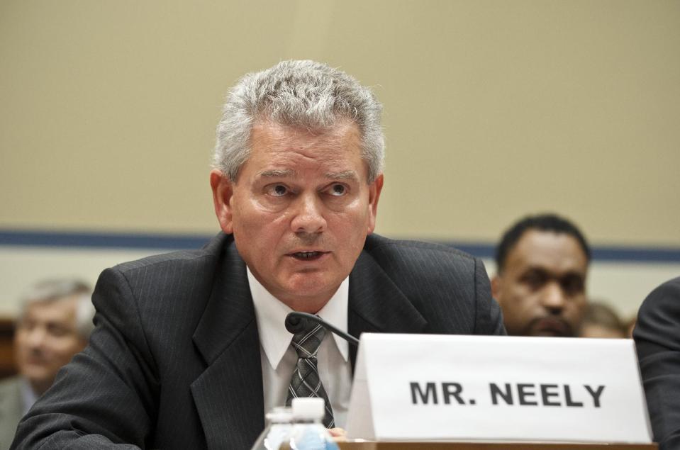 Appearing before the House Committee on Oversight and Government Reform, former GSA official Jeff Neely declines to answer questions at a hearing about wasteful spending and excesses at a Las Vegas conference, on Capitol Hill in Washington, Monday, April 16, 2012. Neely, formerly the regional commissioner of the Public Buildings Service, Pacific Rim Region, was ordered to leave the witness table after invoking his rights to not testify on the advice of his counsel. (AP Photo/J. Scott Applewhite)