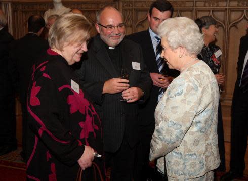 Meeting Queen Elizabeth at Windsor Castle in 2010 (Getty)