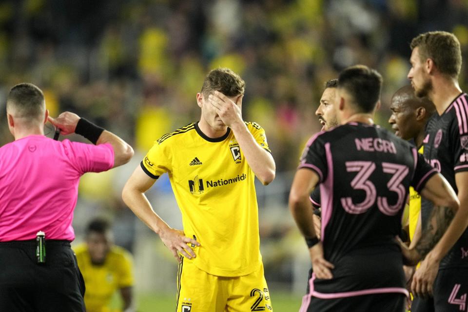 Apr 29, 2023; Columbus, Ohio, United States;  Columbus Crew midfielder Sean Zawadzki (25) wipes his face with his hand while waiting for a referee call determination to be made during the second half of the MLS soccer game between Columbus Crew and Inter Miami at Lower.com Field on Saturday night. Mandatory Credit: Joseph Scheller-The Columbus Dispatch