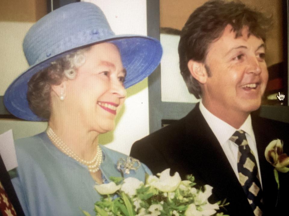 Paul McCartney posted this photo with QEII on his Instagram page