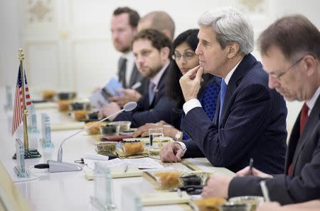 U.S. Secretary of State John Kerry listens to an opening statement by Turkmen President Gurbanguly Berdimuhamedov (not seen) at the start of a meeting at the Oguzkhan Presidential Palace in Ashgabat November 3, 2015. REUTERS/Brendan Smialowski/Pool