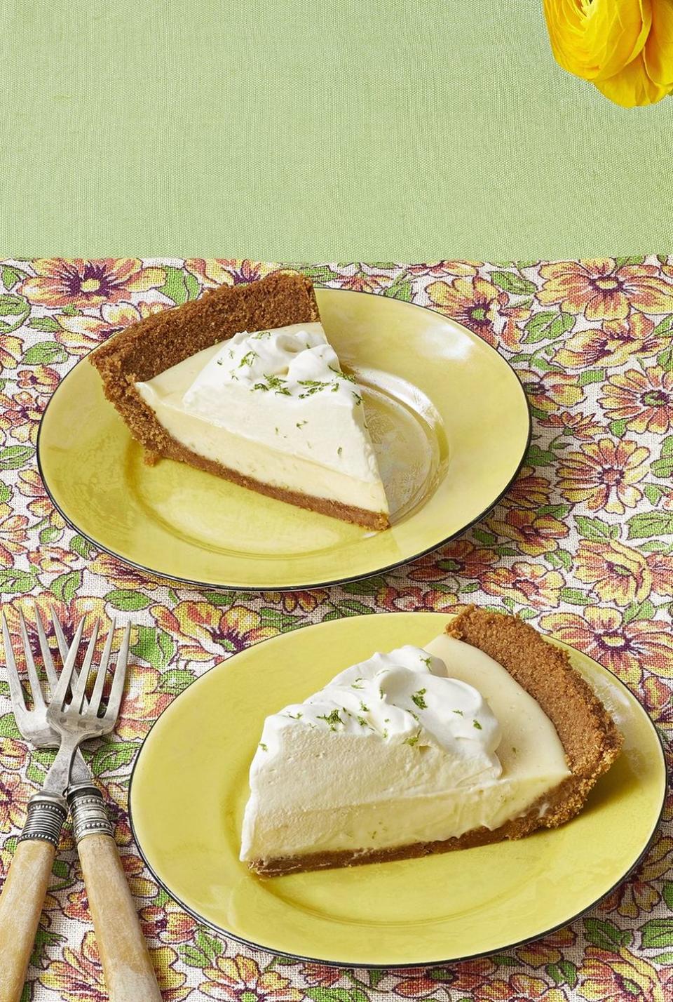 classic key lime pie slices on yellow plates