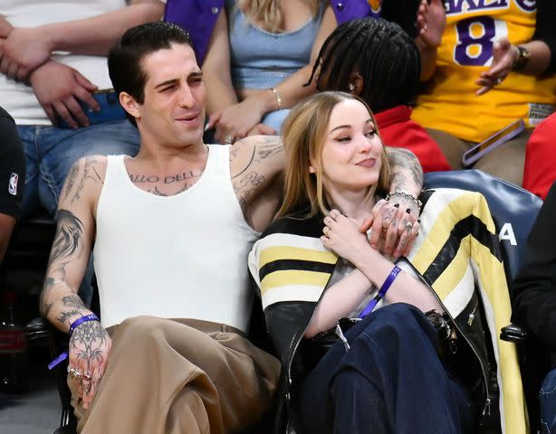 <p> Allen Berezovsky/Getty</p> Damiano David and Dove Cameron at the Lakers game on Feb. 13 in Los Angeles