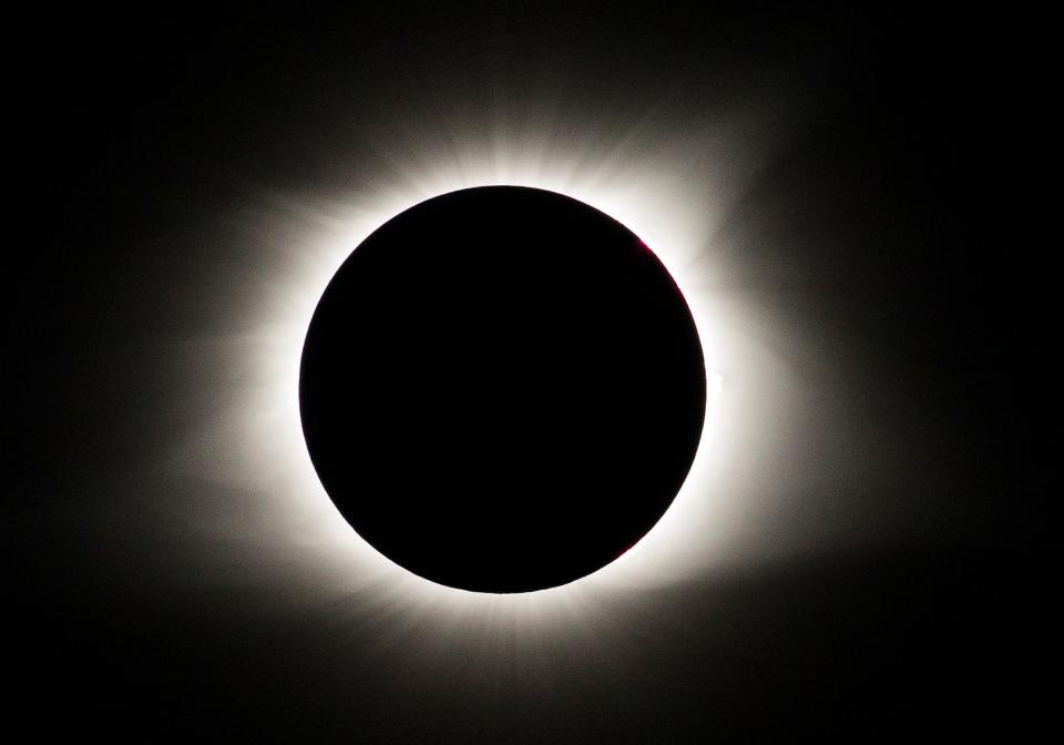The sun's corona is seen around the outside of the moon as it blocks the sun during a total solar eclipse Aug. 21, 2017, over Hayes Canyon Campground in Eddyville, Ill.