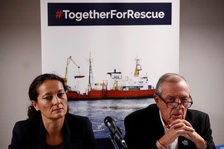 FILE PHOTO: Sophie Beau, Vice-President of the International Network of SOS Mediterranee, and Francis Vallat, President of SOS Mediterranee France, attend a news conference about the charity rescue ship Aquarius after Panama revoked their registration, in Paris, France, September 24, 2018. REUTERS/Christian Hartmann/File Photo