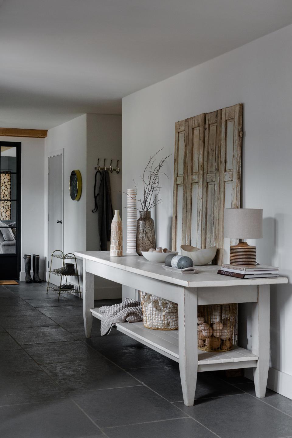 Style a console table with a rustic nod