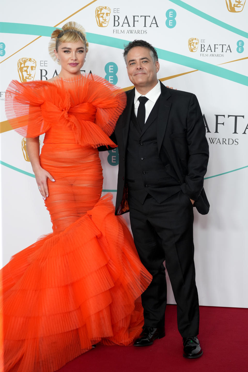 Florence Pugh and Writer and director Sebastián Lelio attend the EE BAFTA Film Awards 2023 at The Royal Festival Hall on February 19, 2023 in London, England