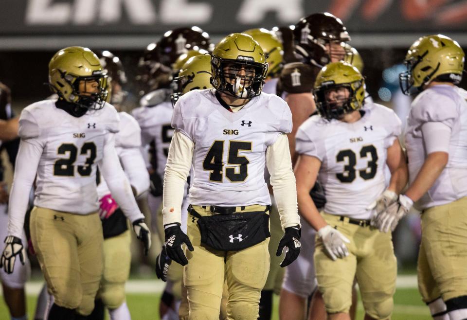 Sacred Heart-Griffin's Cory West (45) reacts after a touchdown from Joliet Catholic in the first half of the IHSA Class 4A Football State Championship at Huskie Stadium in Dekalb, Ill., Friday, November 26, 2021. [Justin L. Fowler/The State Journal-Register] 